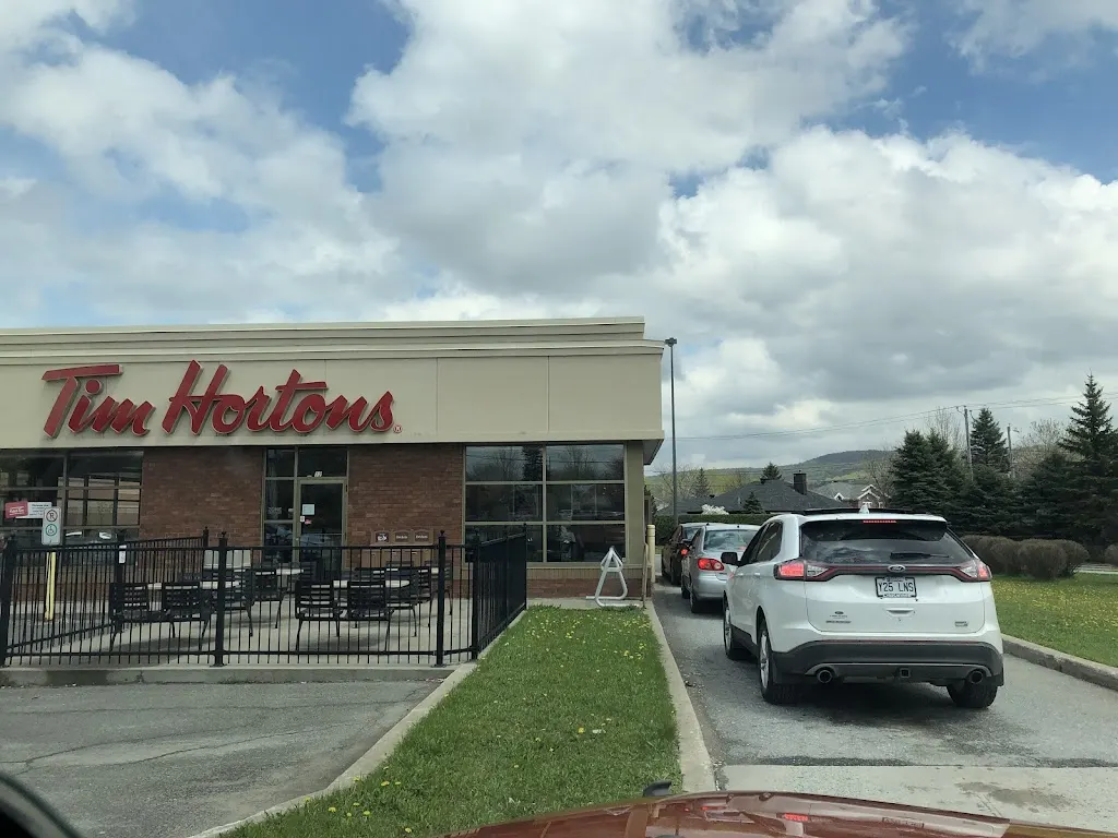 Tim Hortons storefront and interior at 12 Rue De La Grande-place, Victoriaville, QC
