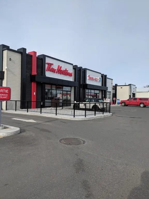 Tim Hortons storefront and interior at 1465 Jutras Ouest, Victoriaville, QC