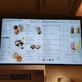 Tim Hortons storefront and interior at 5 Rue Nord, Waterloo, QC