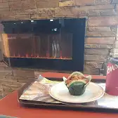 Tim Hortons storefront and interior at 5 Rue Nord, Waterloo, QC