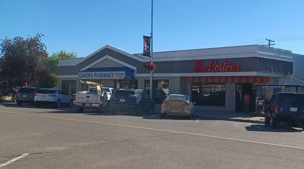Tim Hortons storefront and interior at 216 Main St, Canora, SK