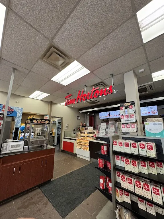 Tim Hortons storefront and interior at 402 main street, Creighton, SK