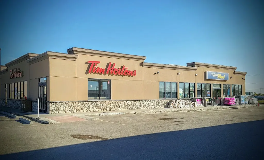 Tim Hortons storefront and interior at 20 Great Plains Rd, Emerald Park, SK