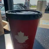 Tim Hortons storefront and interior at 20 Great Plains Rd, Emerald Park, SK