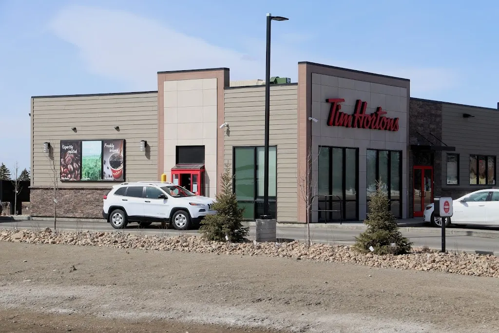 Tim Hortons storefront and interior at 210b Highway 56, Indian Head, SK