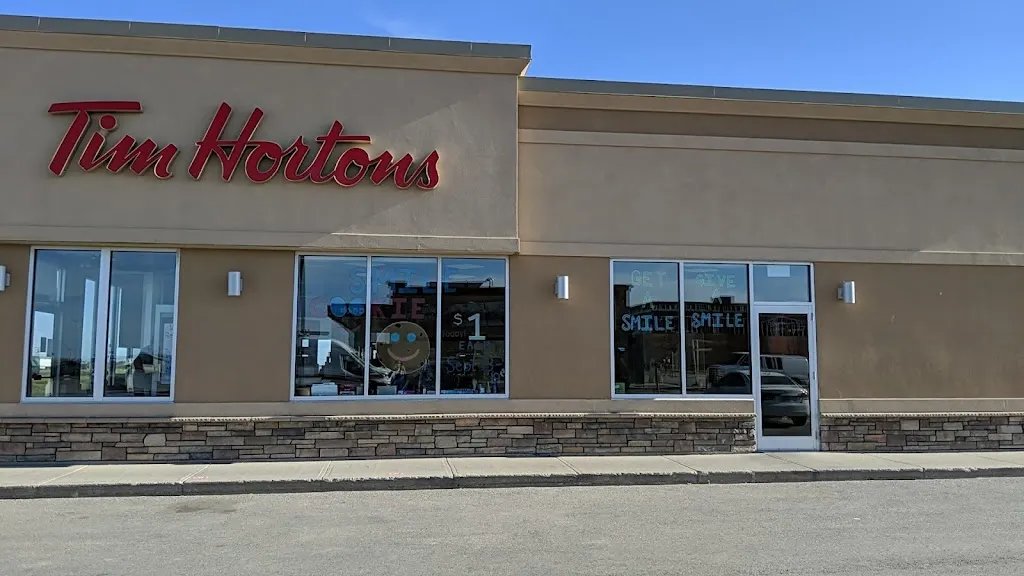 Tim Hortons storefront and interior at 119 East Access Rd, Moosomin, SK