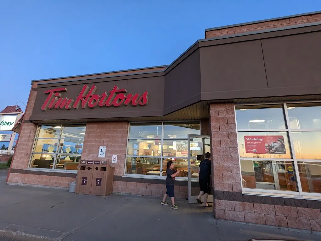 Tim Hortons storefront and interior at 9803 Territorial Dr, North Battleford, SK