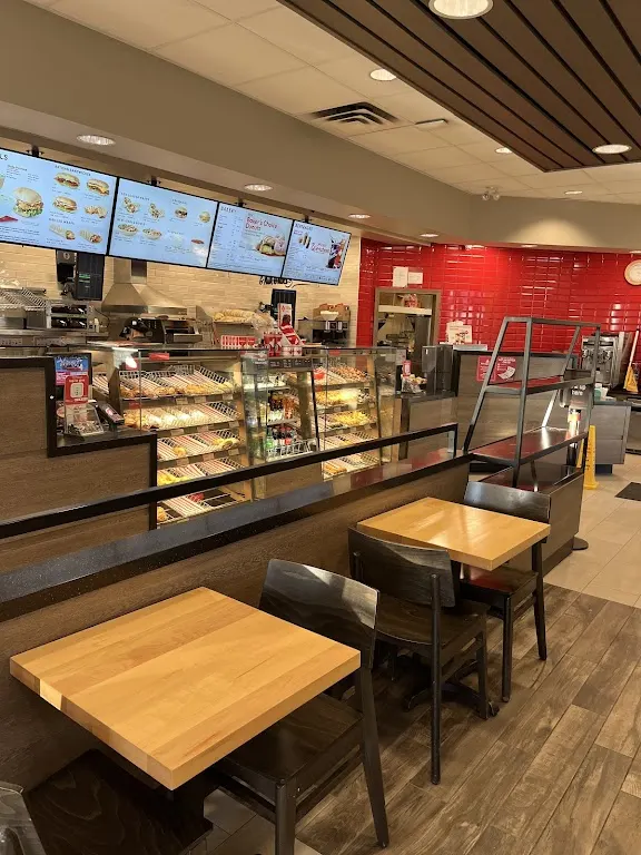 Tim Hortons storefront and interior at 11402 Railway Ave E, North Battleford, SK