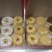 Tim Hortons storefront and interior at 11402 Railway Ave E, North Battleford, SK