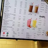 Tim Hortons storefront and interior at 4533 Parliament Ave, Regina, SK