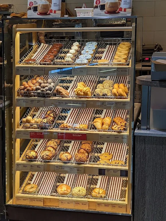 Tim Hortons storefront and interior at 2625 Airport Dr, Saskatoon, SK