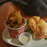 Tim Hortons storefront and interior at 3134 Clarence Ave S, Saskatoon, SK