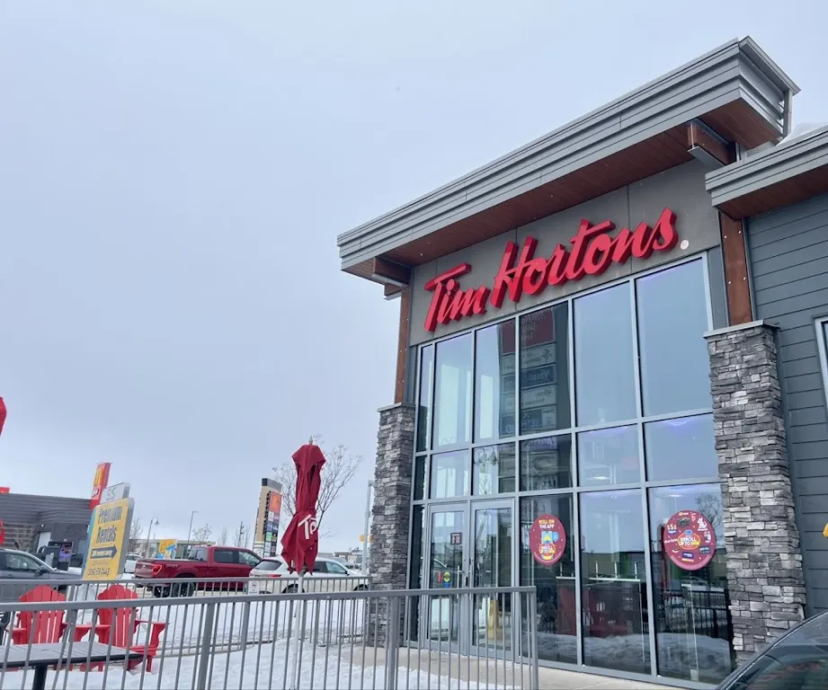 Tim Hortons storefront and interior at 3203 Preston Avenue South, Saskatoon, SK