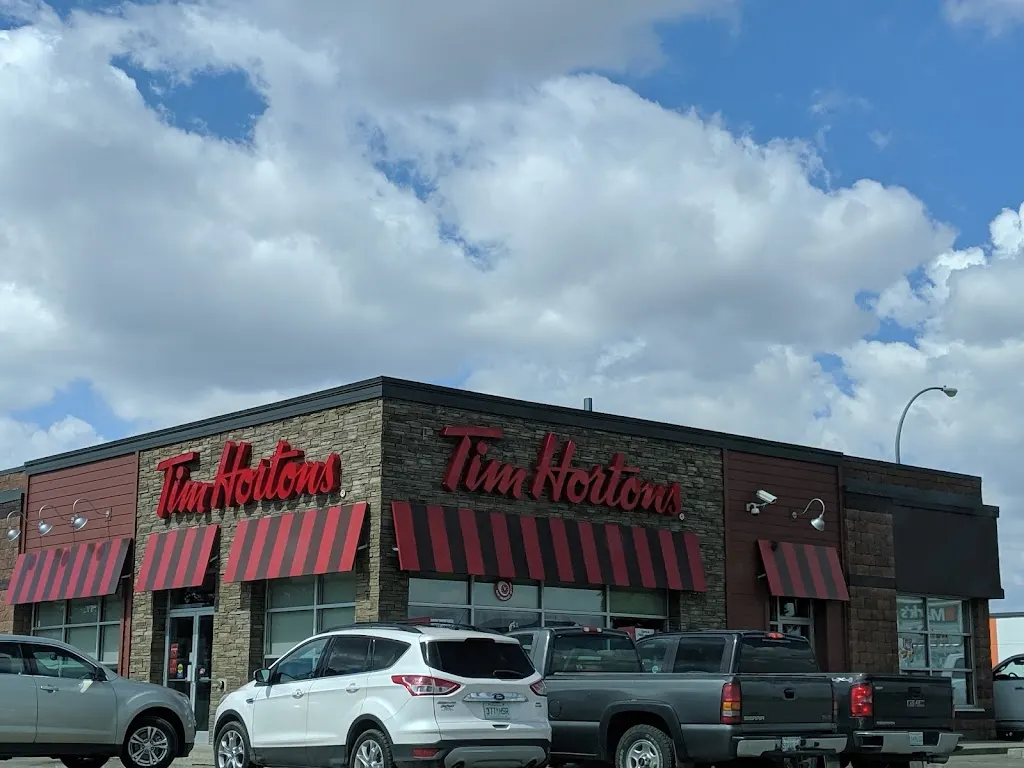 Tim Hortons storefront and interior at 1060 Sims Ave, Weyburn, SK