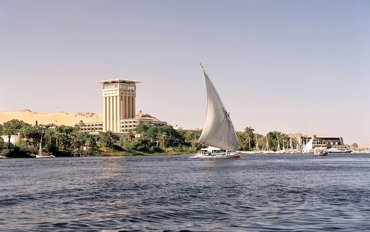Feluccas and granite boulders on the Nile at Elephantine Island, Aswan