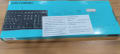 Back view of Logitech K120 Corded USB Keyboard box with product details and importer label