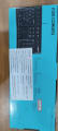Top view of Logitech K120 Corded USB Keyboard box with importer label