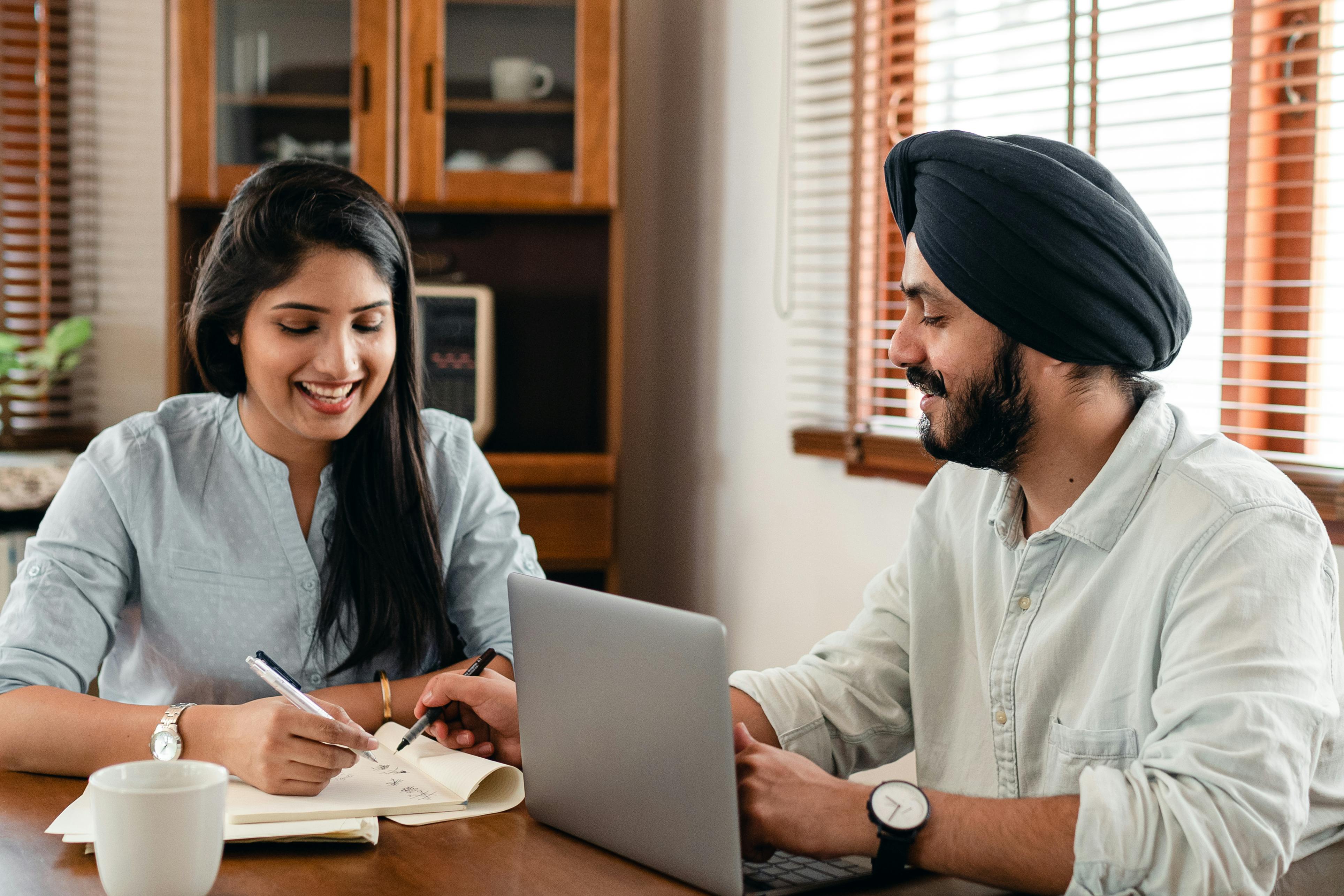 Business owners planning a company announcement