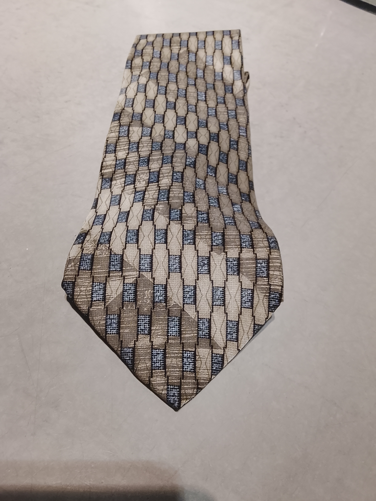 Mönstrad slips i beige toner