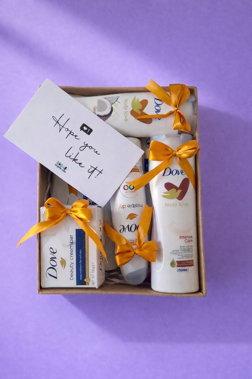 Dove beauty self care hamper in Kenya with body lotion and gift ribbon