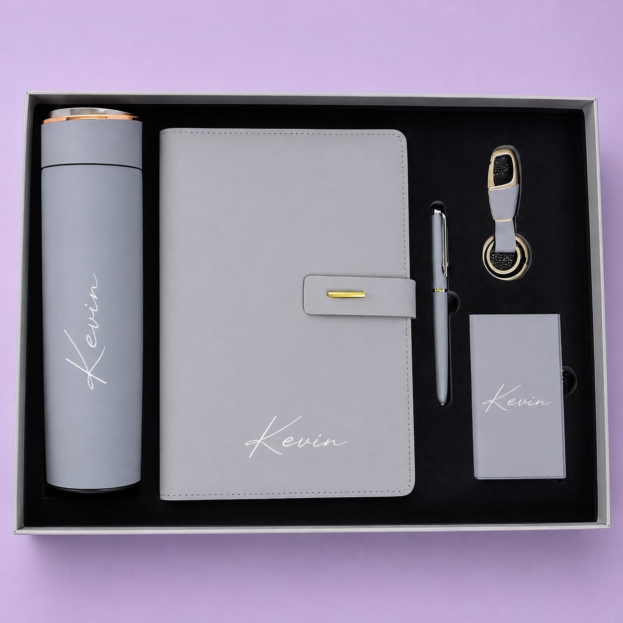 Executive personalized gift set with white custom branded notebook and vertical laser engraved thermal flask by DnD Gifts Kenya