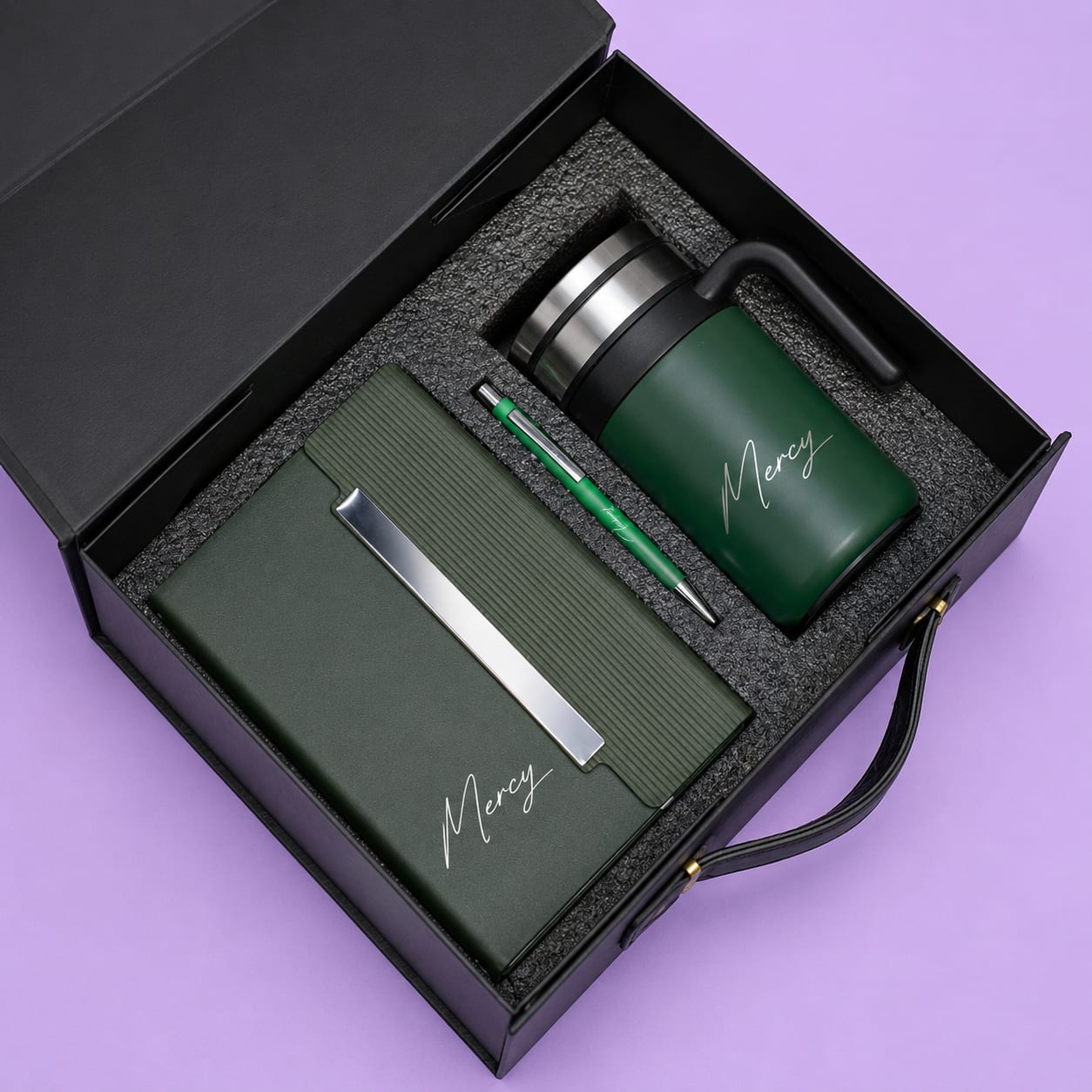 Customized green executive corporate gift set with engraved thermos mug, notebook, and pen in Nairobi Kenya