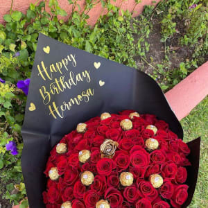 Bouquet of red roses and ferrero chocolates