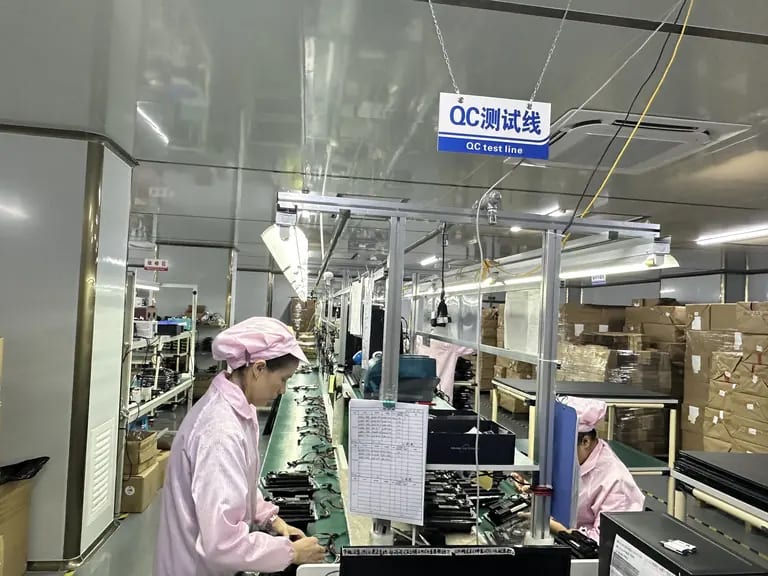 Quality control inspection line in manufacturing workshop