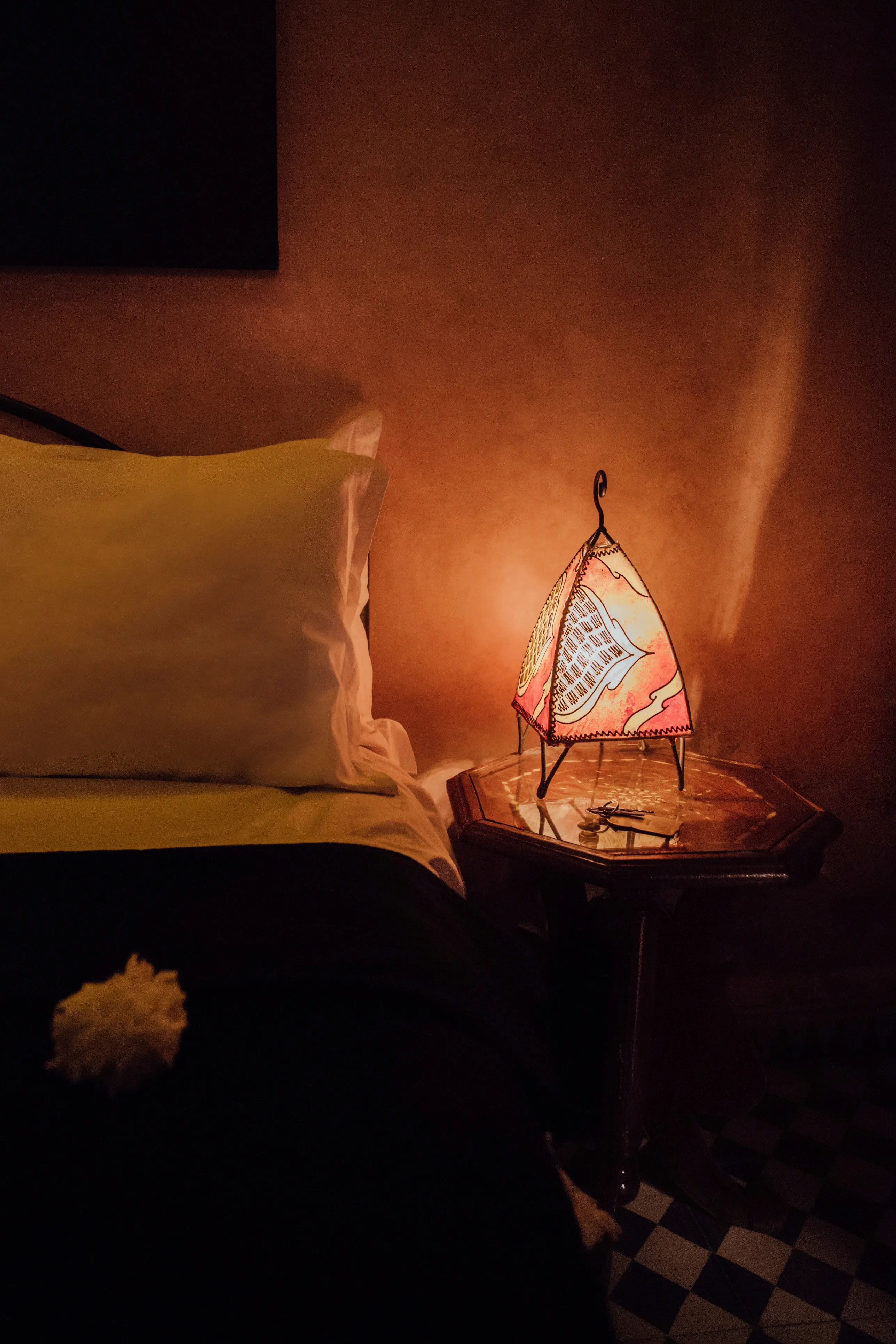 Traditional Moroccan decor in Bahia room at Riad Bensaid featuring handcrafted furnishings