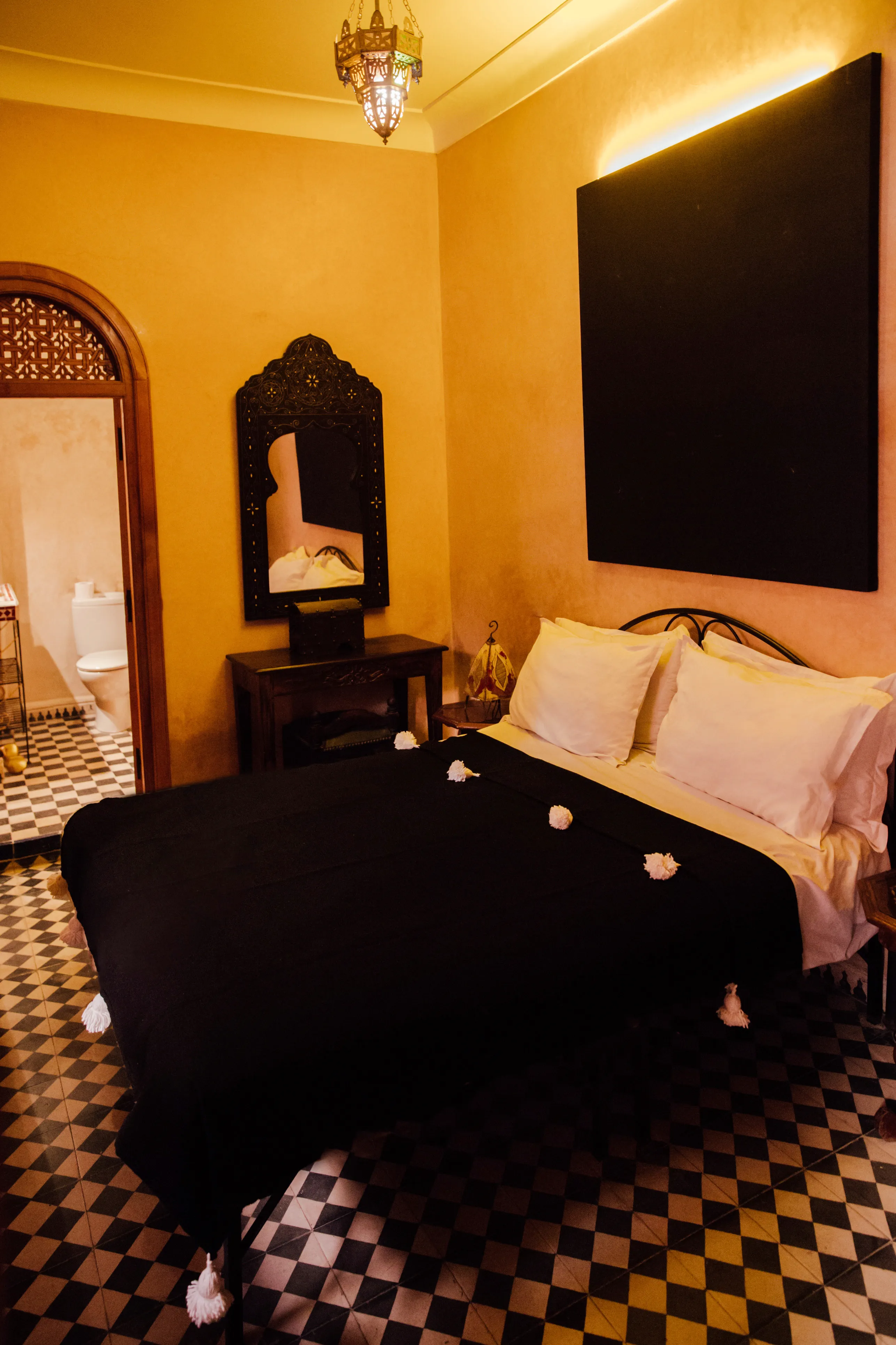 Bahia room interior at Riad Bensaid showing traditional Moroccan palace-style design in Medina