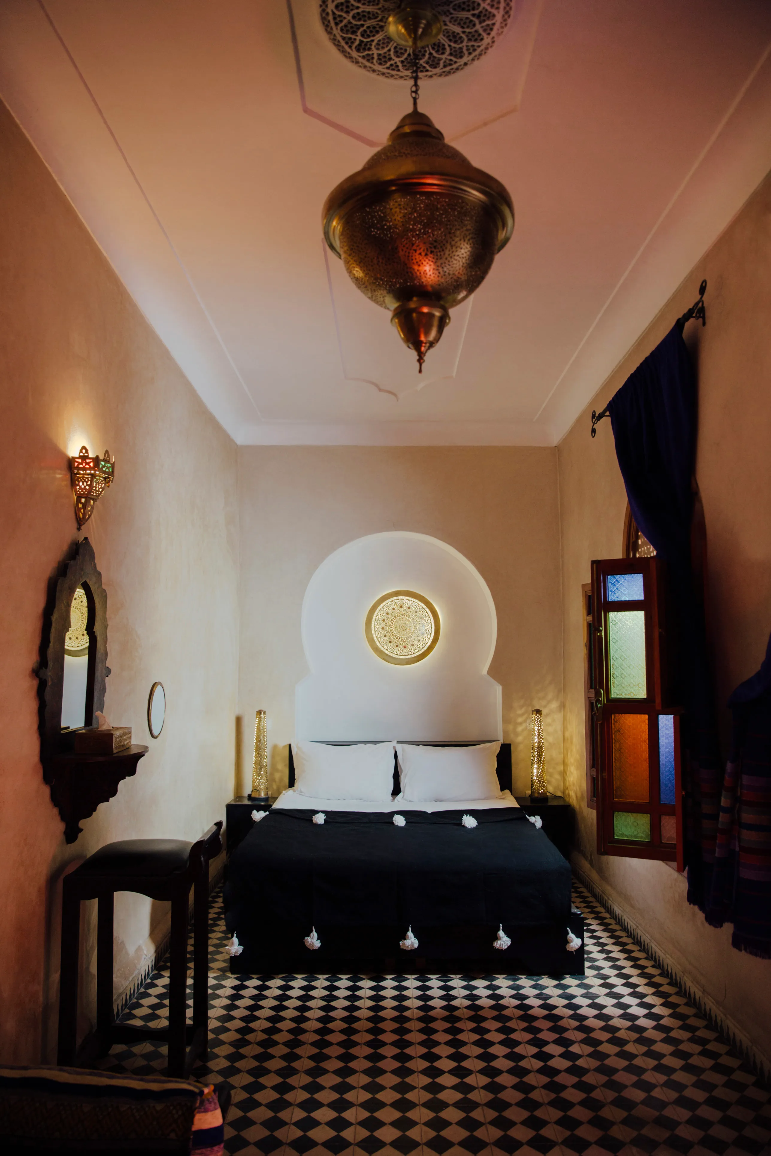 Different angle of Marjana room at Riad Bensaid showcasing spacious layout and traditional decor