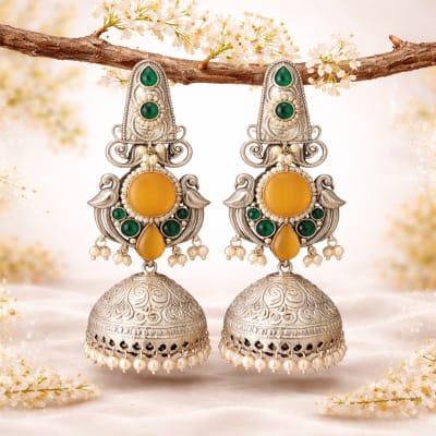 Designer Yellow Stone Silver Jhumka Earrings with Green Accents