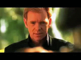 CSI Miami GIF of him putting on his sunglasses