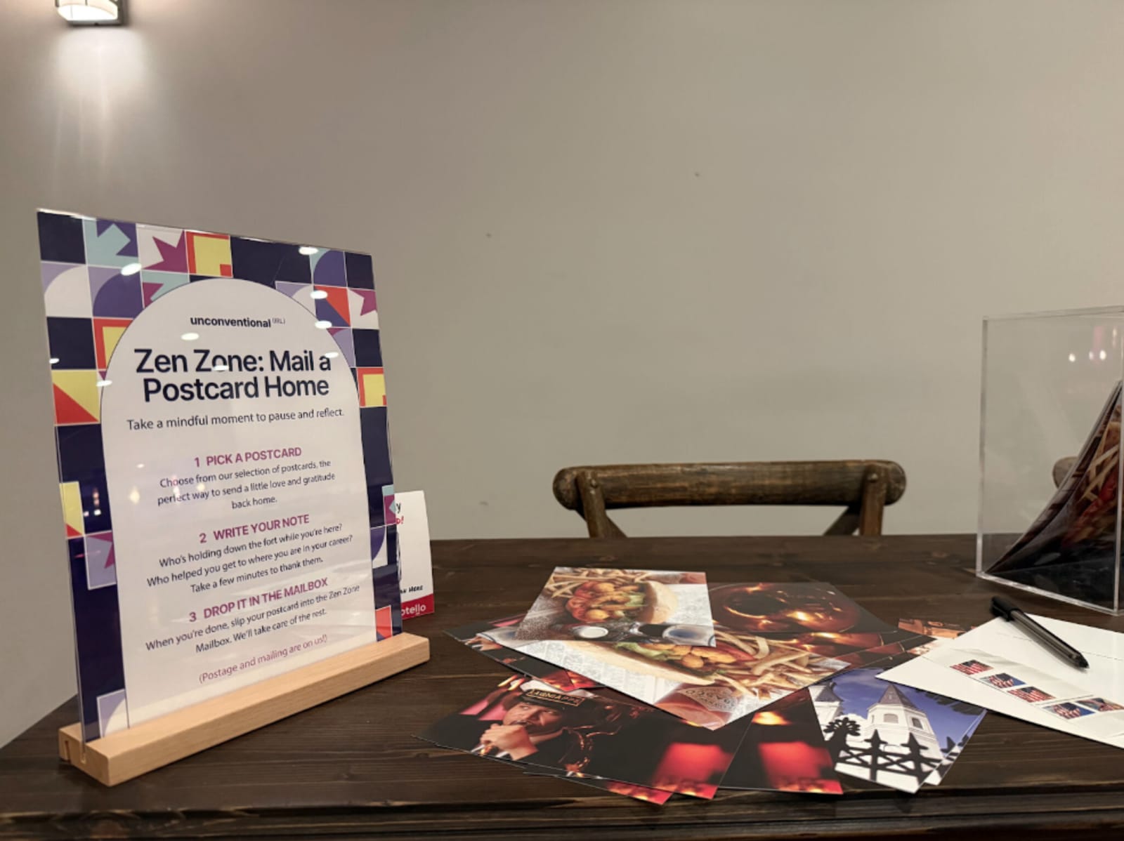 A quiet zone at Swoogo’s Unconventional (IRL) invites attendees to pause, reflect, and recharge with a postcard-writing activity.