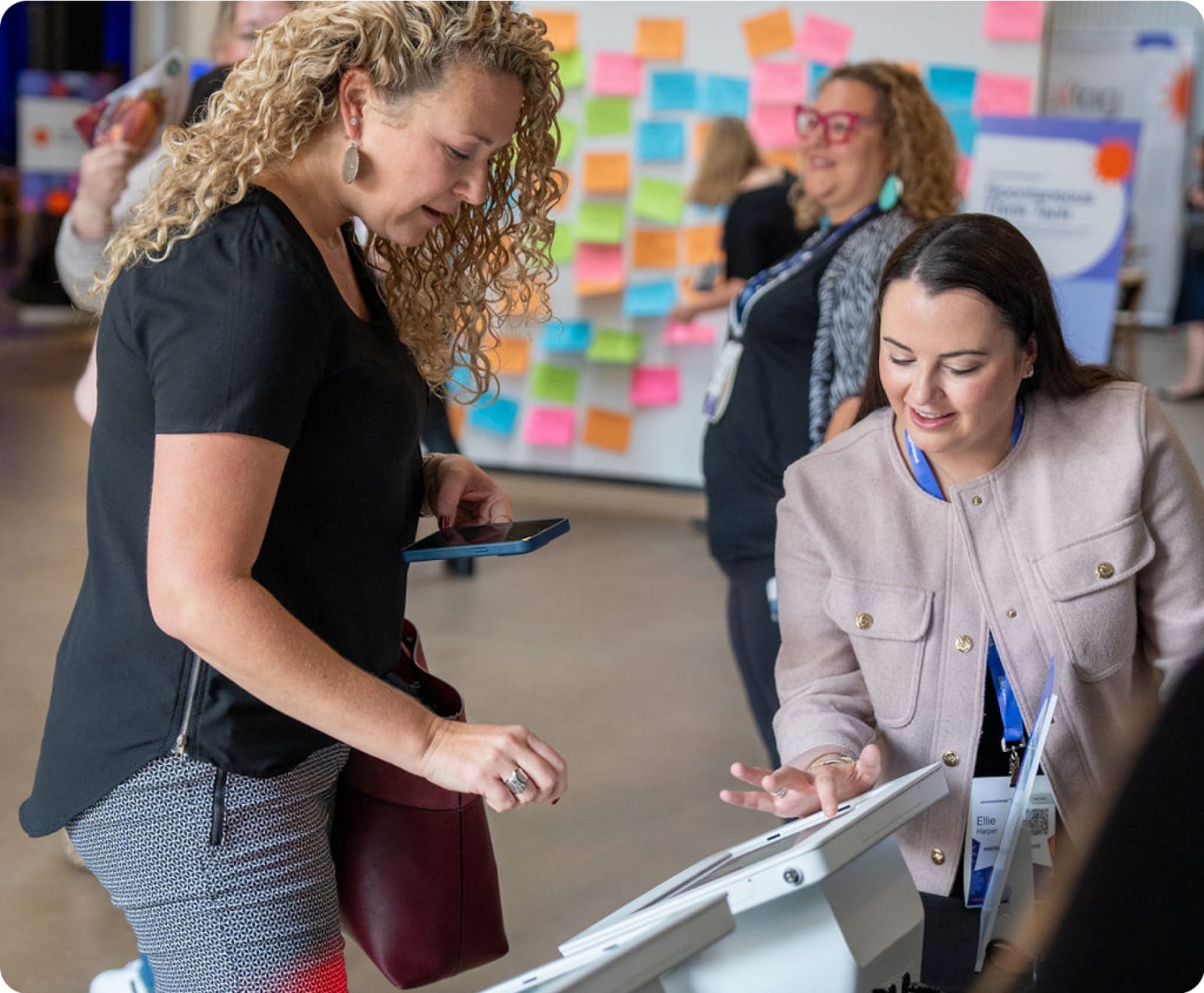 Attendees checking in at a Swoogo event