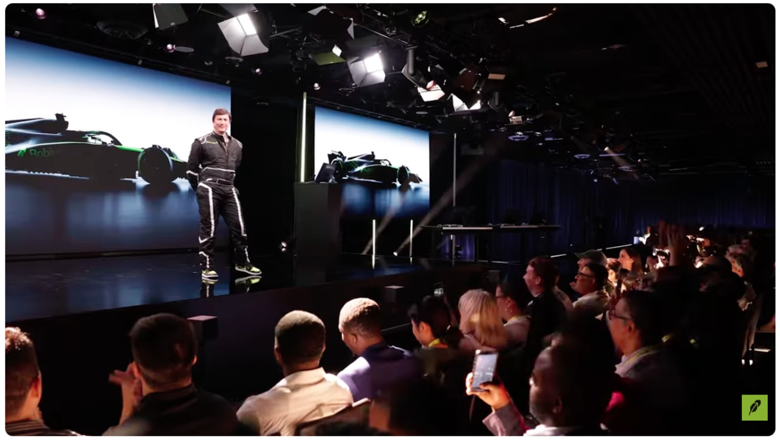 Robinhood CEO speaking at speed-themed HOOD Summit 2025