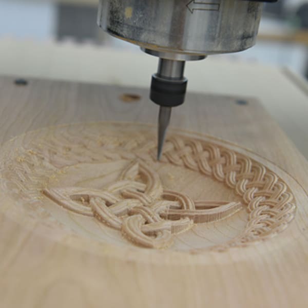 Gravure sur bois et plastique