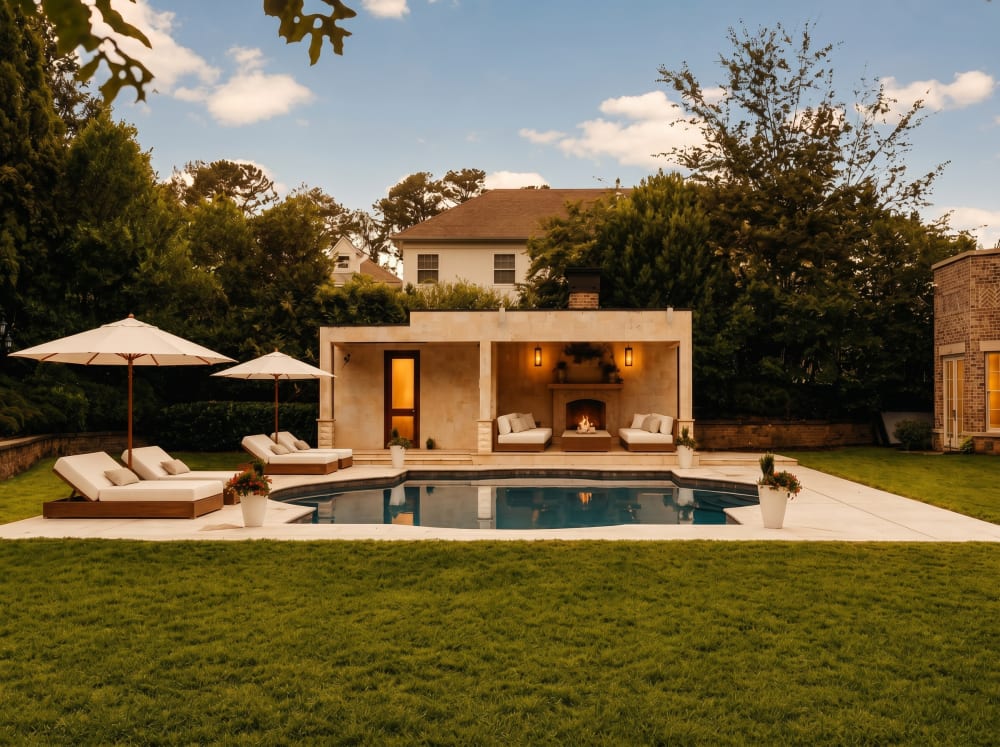 Pool pavilion and lawn surrounded by mature trees at Fauzan Country Club