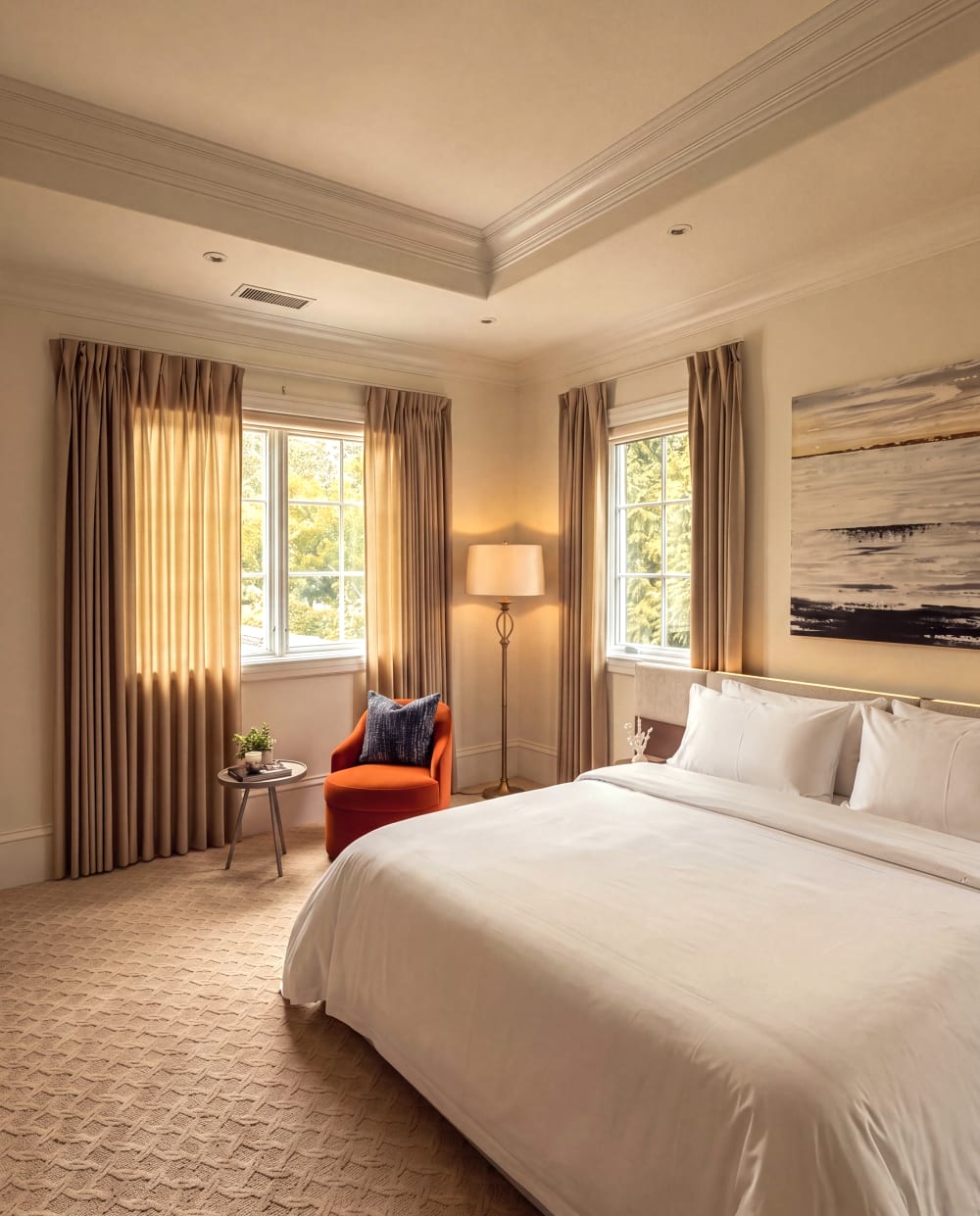 Bedroom with a recessed ceiling and soft neutral furnishings at Fauzan Country Club