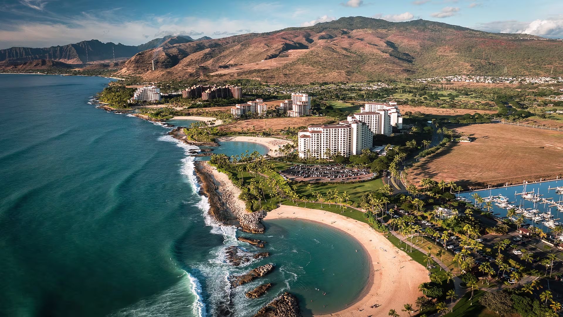 Aerial view of Ko Olina Resort lagoons, hotels, and marina on O'ahu's west side
