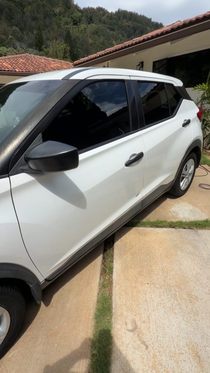 White Nissan Kicks freshly detailed, Oahu