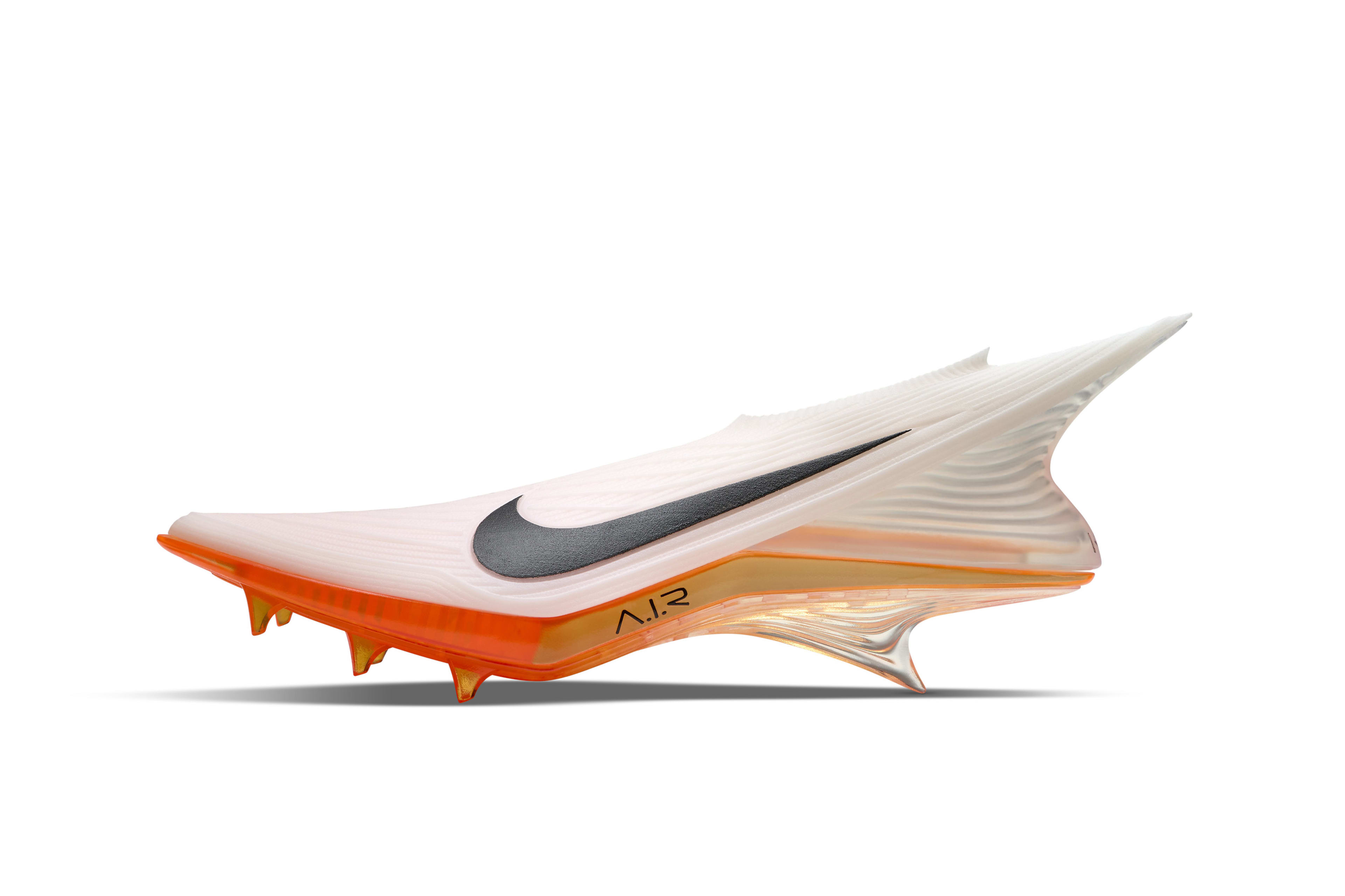 Left view of shoe concept in white for Kylian Mbappe featuring a full length air unit integrated throughout the underfoot plate, underfoot traction, and a boot profile inspired by the function of a track spike.