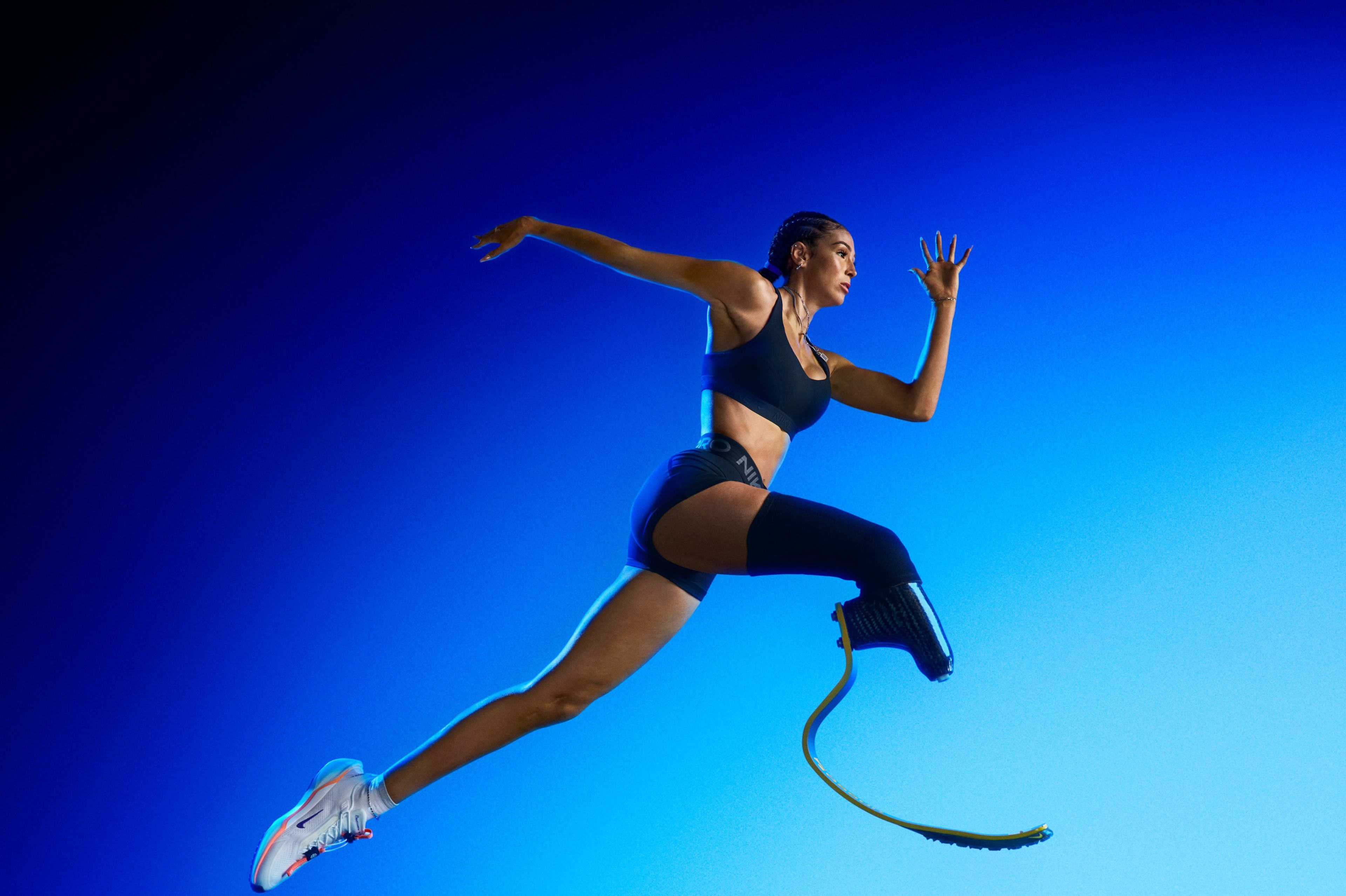 American long jumper and sprinter Beatriz Hatz in mid air jumping while wearing the Nike Pegasus EasyOn