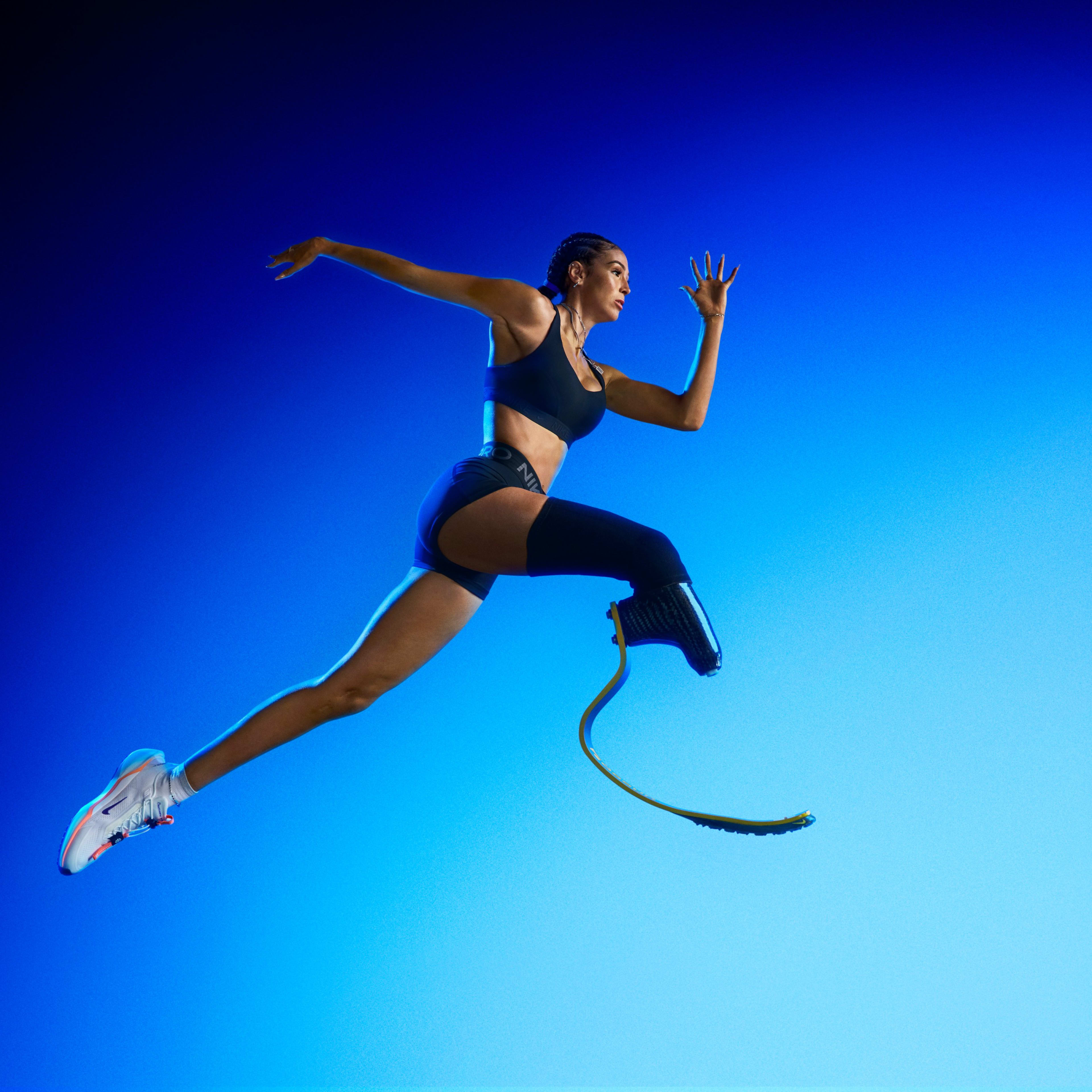 American long jumper and sprinter Beatriz Hatz in mid air jumping while wearing the Nike Pegasus EasyOn