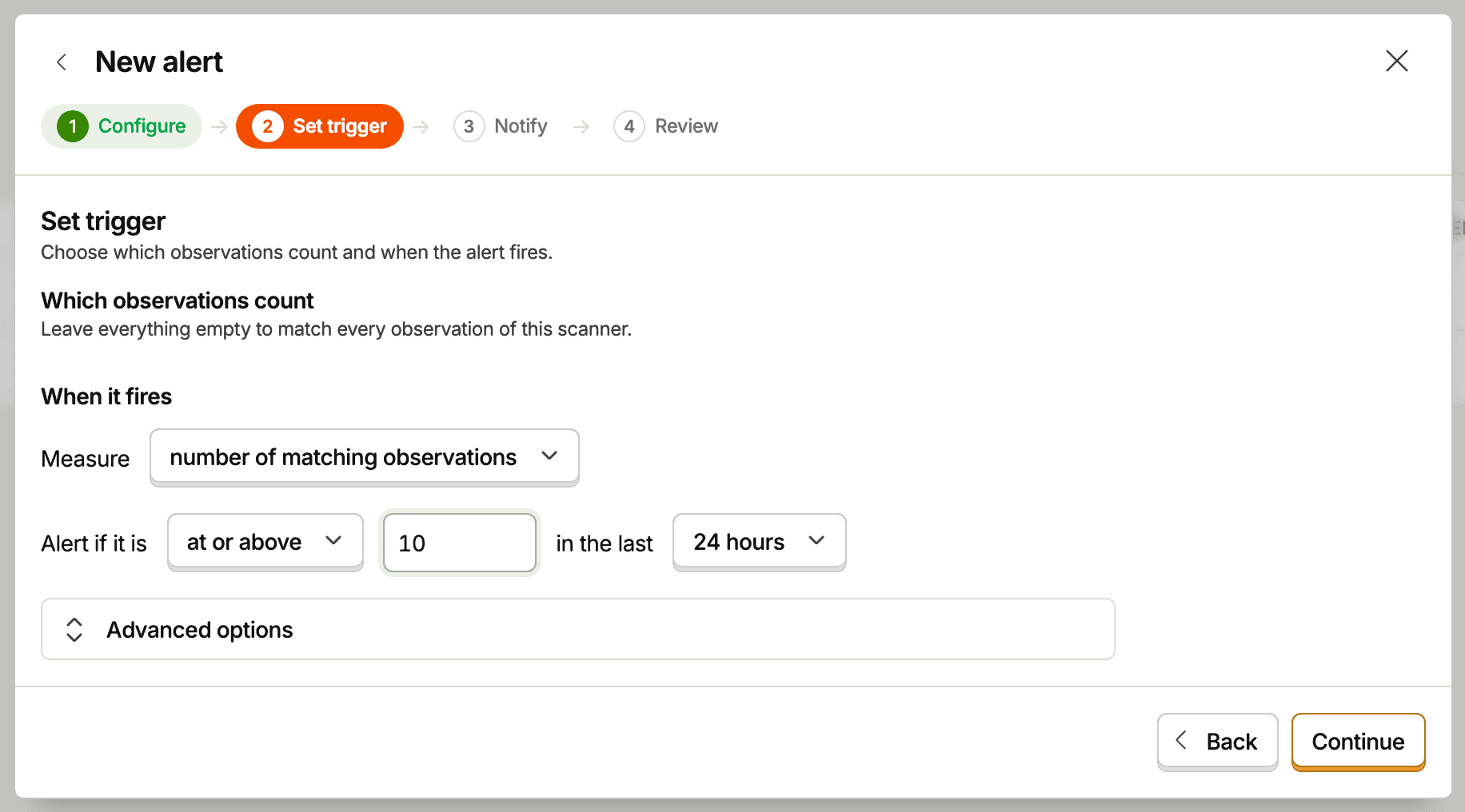 The Set trigger step of the new alert form, set up as a metric threshold