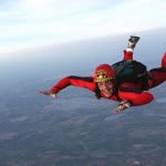 Smiling skydiver in free fall