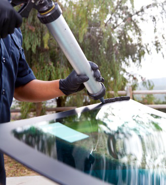 putting on a new windshield