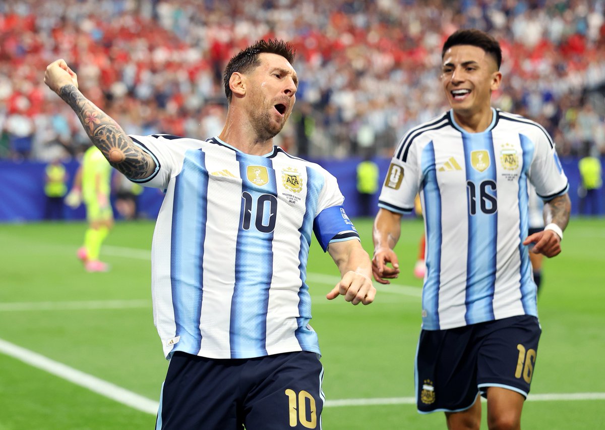 Lionel Messi creates history as Argentina beats Austria 2-0 to seal a place in the knockout rounds