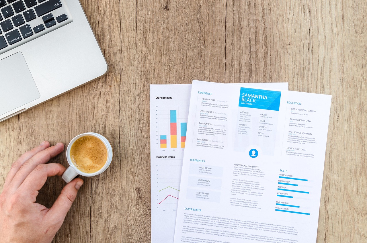 Professional preparing a tailored resume to optimize job search success and reduce anxiety - career resume tips