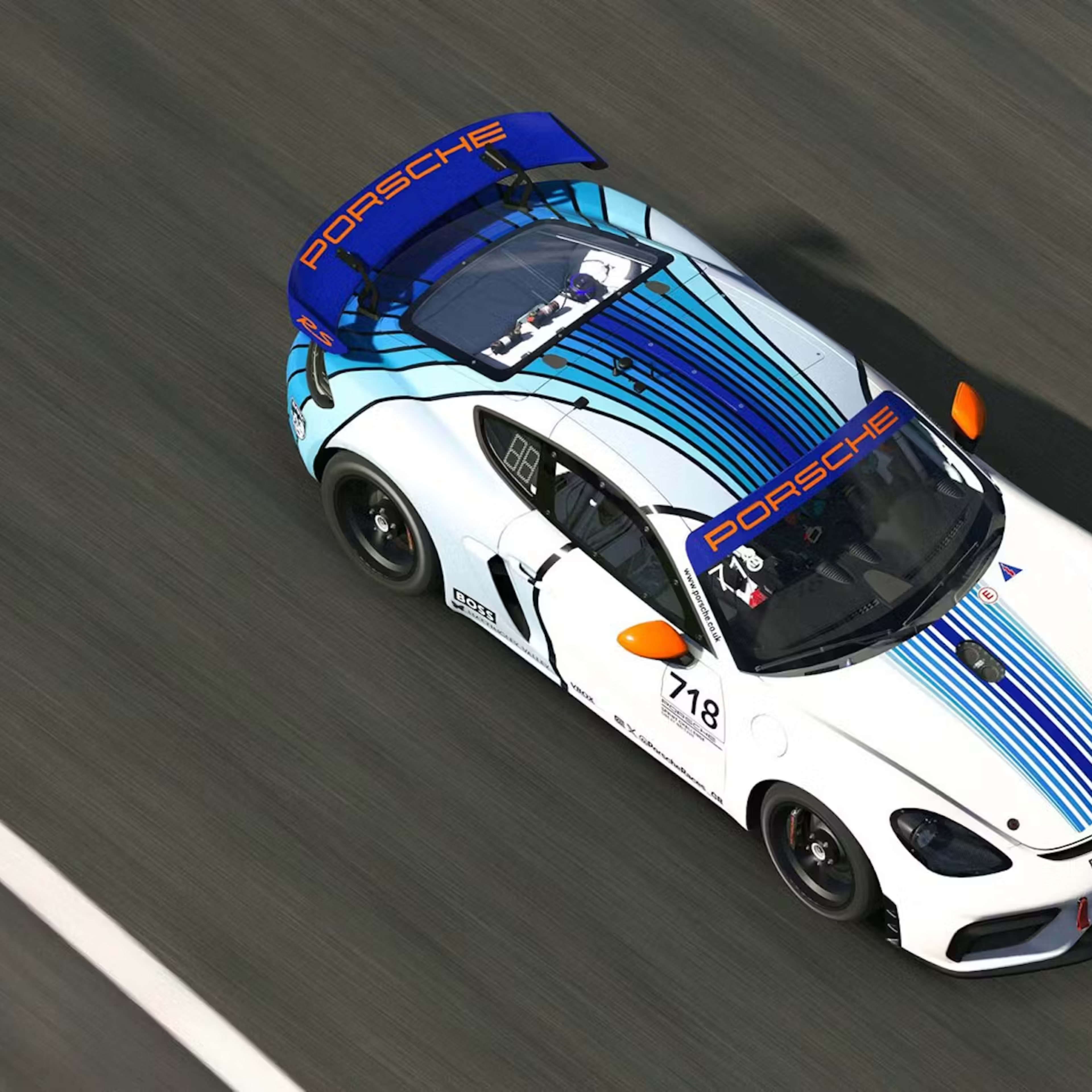 Arial view of a virtual 718 Cayman on a racetrack
